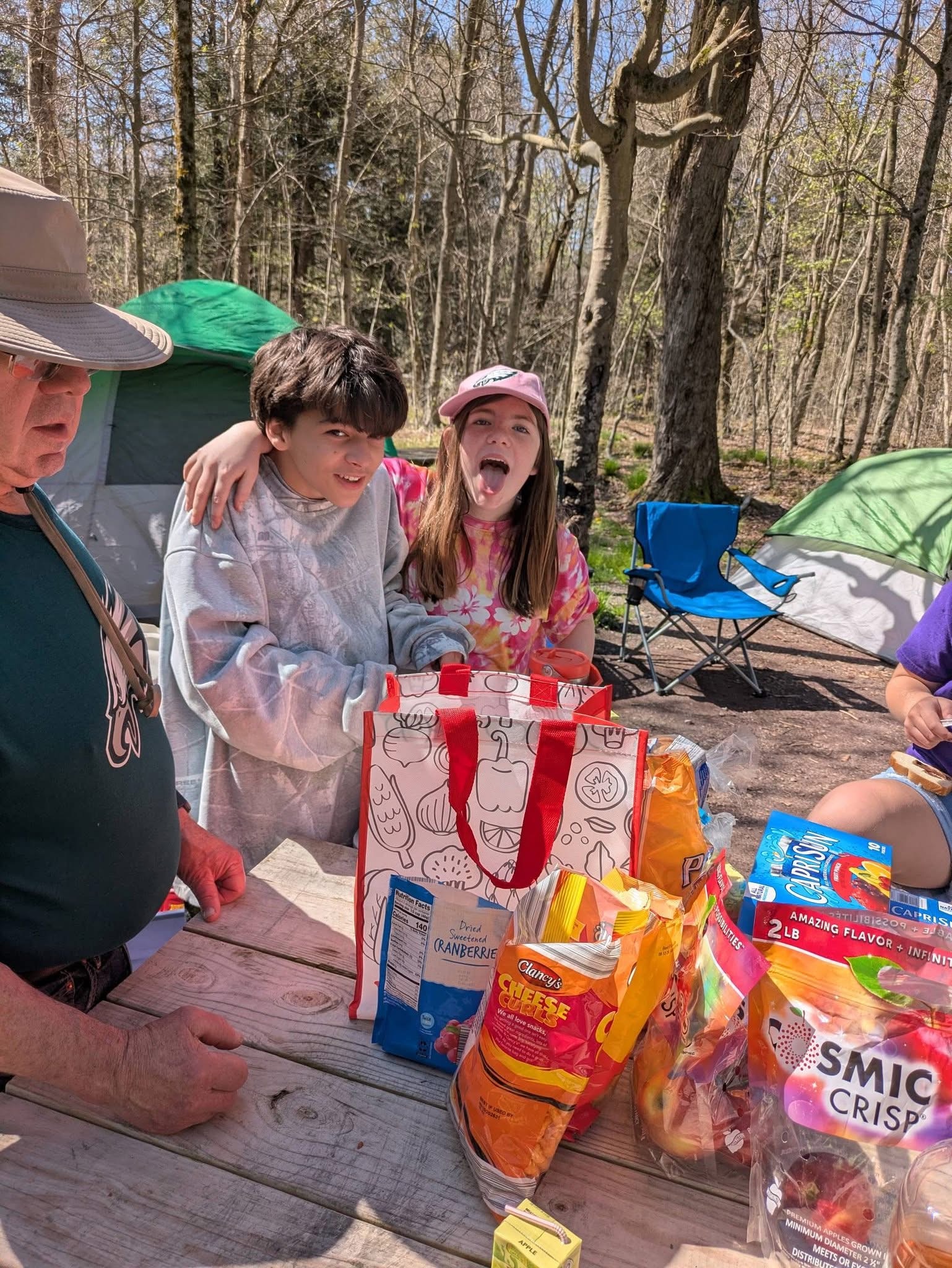 Scouts enjoying summer outdoor activities at camp